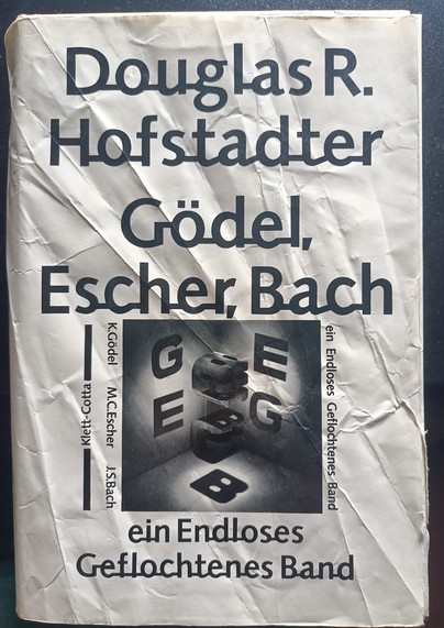 Buchdeckel:

Douglas R. Hofstadter - Gödel, Escher, Bach

ein Endloses Geflochtenes Band