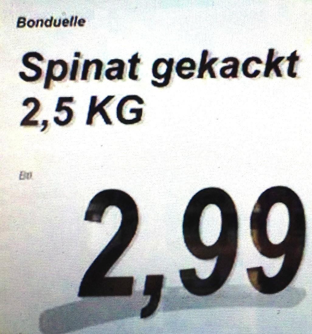 Weißes Preisschild mit schwarzer Schrift:

Bonduelle
Spinat gekackt
2,5 KG
2,99